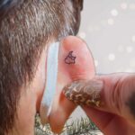 雲と月のタトゥー20241216